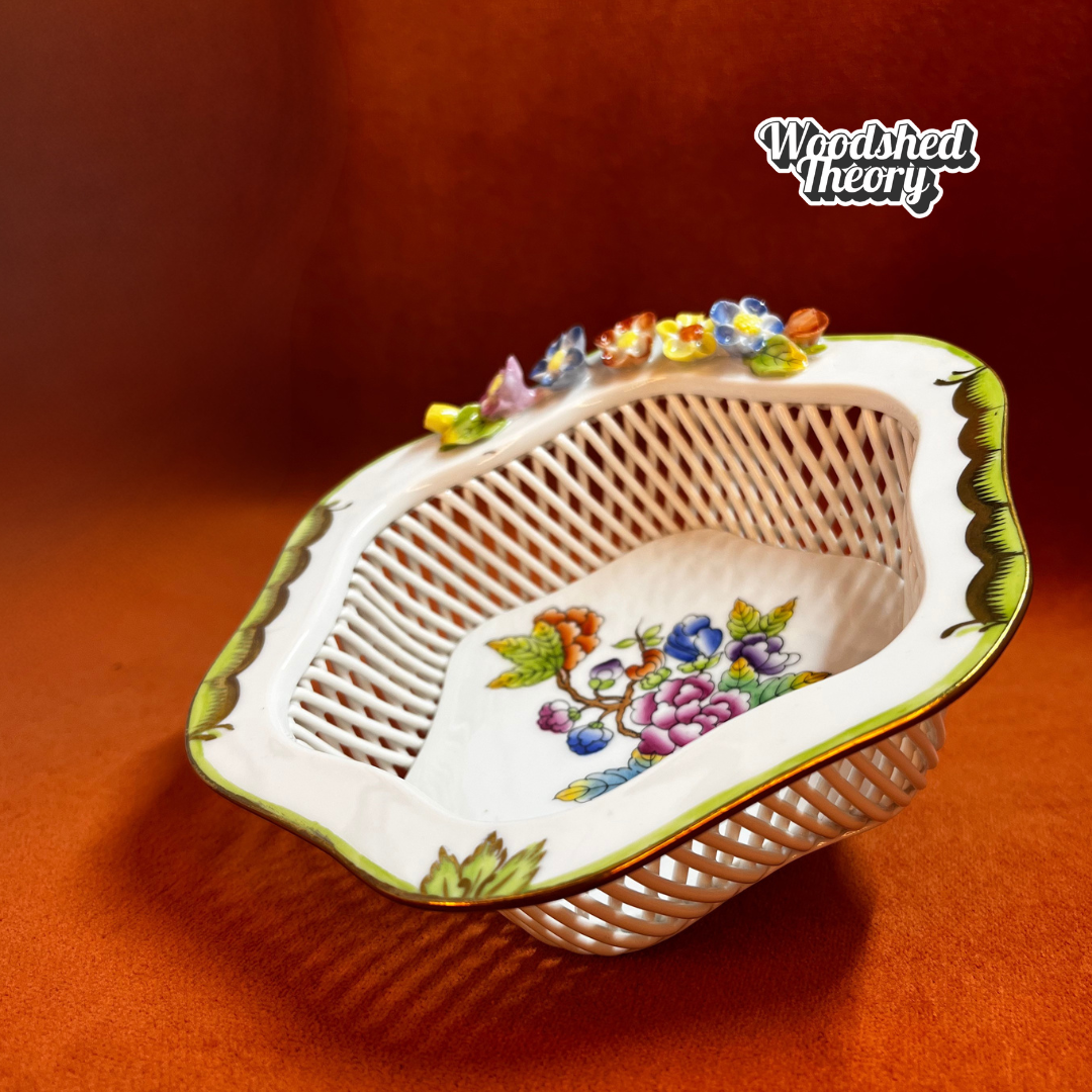 Vintage Herend Hungarian porcelain dish in Rothschild Bird pattern with woven basket design and raised flowers. side