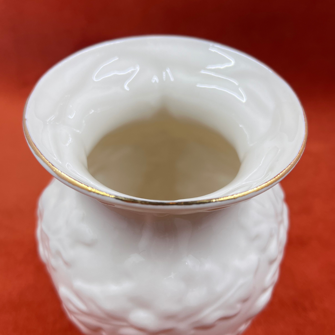 Vintage Belleek Irish porcelain mini vase with acorn and oak leaf design, gold rim, bone china, made in Ireland between 1997-2000, 5 inches tall. close up rim