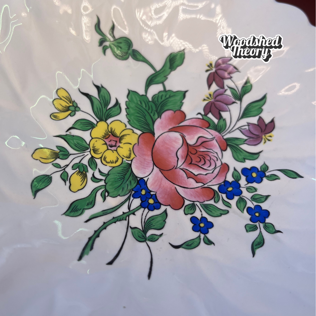 1920s KG Luneville France porcelain leaf-shaped ring dish with hand painted floral bouquet and pink handle close up painting detail