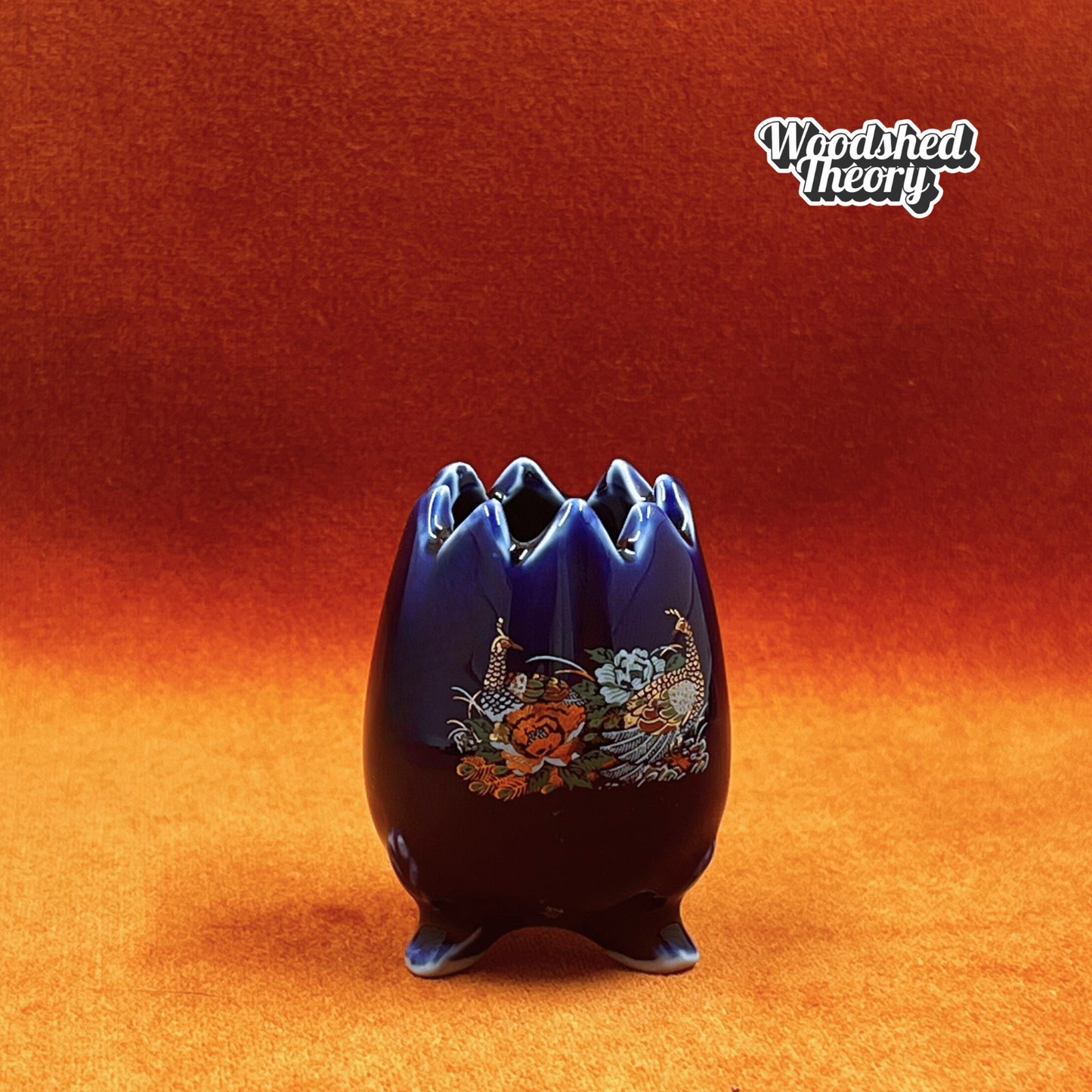 Vintage odd cobalt blue cracked egg toothpick holder decorated with gold pheasant. front