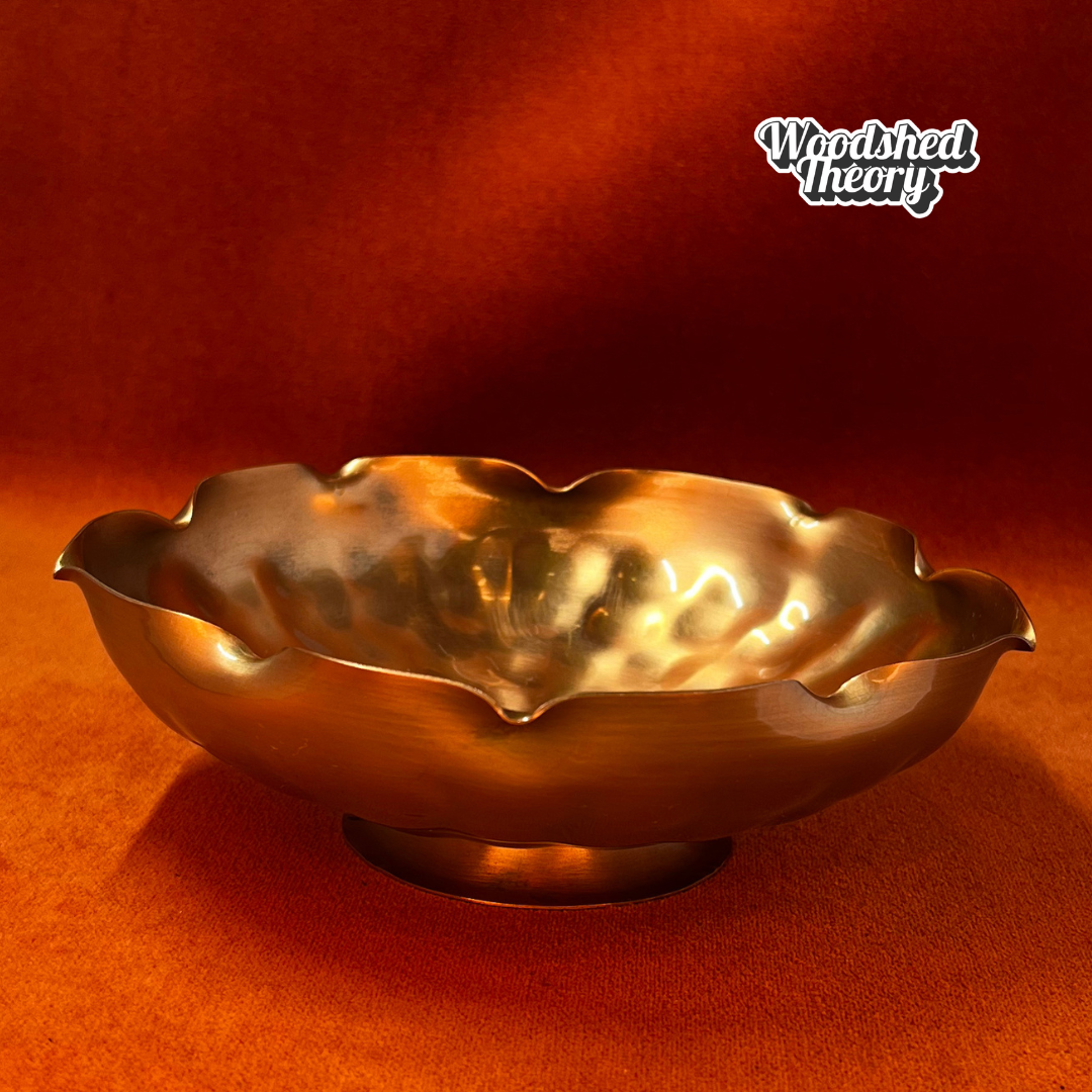 Vintage Gregorian Copper 313 pedestal bowl with hammered finish, ruffled edge, and leaves & berries motif in the center side