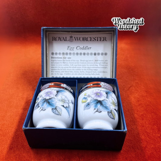 Set of two vintage Royal Worcester floral egg coddlers with chrome lids in original box. in box