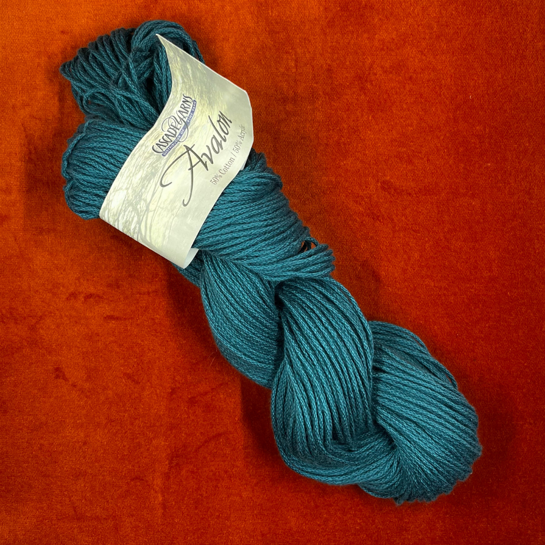Cascade Avalon yarn in Teal (Color 31), 1 hank of aran weight cotton-acrylic blend yarn. top down