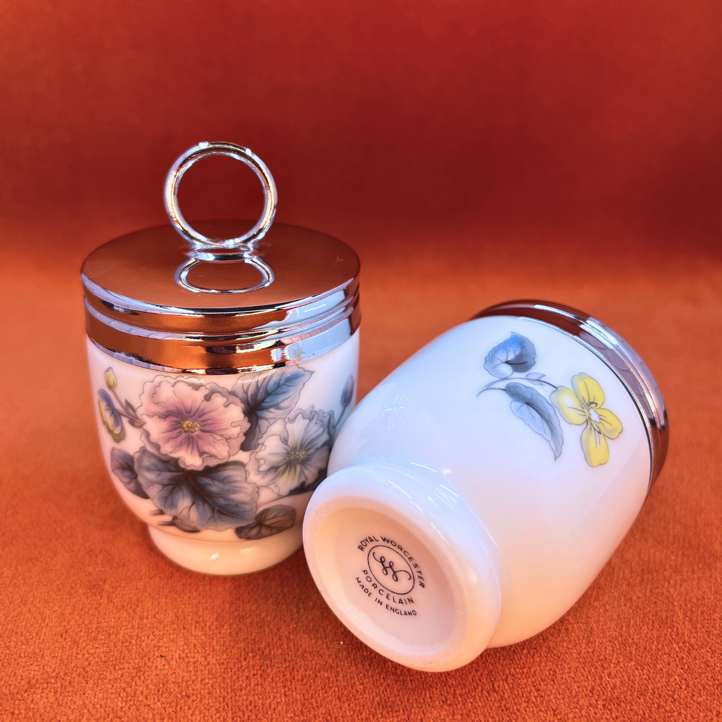 Set of two vintage Royal Worcester floral egg coddlers with chrome lids in original box. bottom mark
