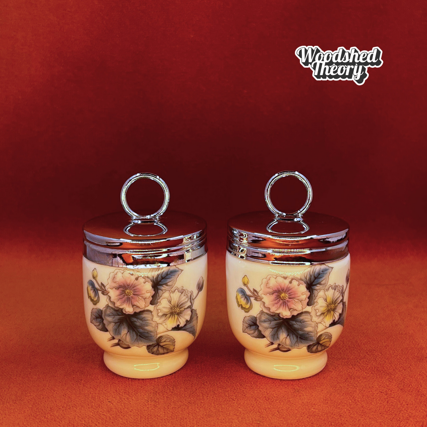 Set of two vintage Royal Worcester floral egg coddlers with chrome lids in original box. front