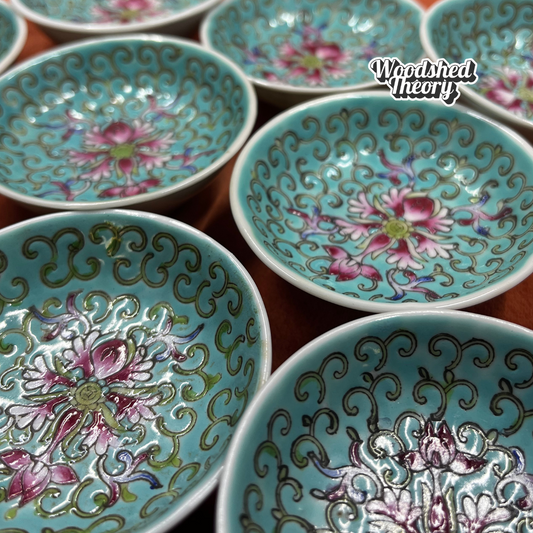 Set of 9 vintage Chinese turquoise porcelain soy sauce dishes with hand-painted Wan Shou Longevity pattern, each slightly unique in size and color. close up detail