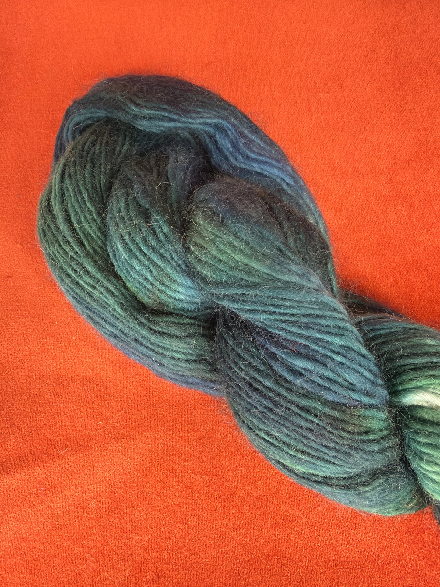 Unlabeled Homespun, Hand-dyed Wool Yarn Teals/Greens 3.7oz close up