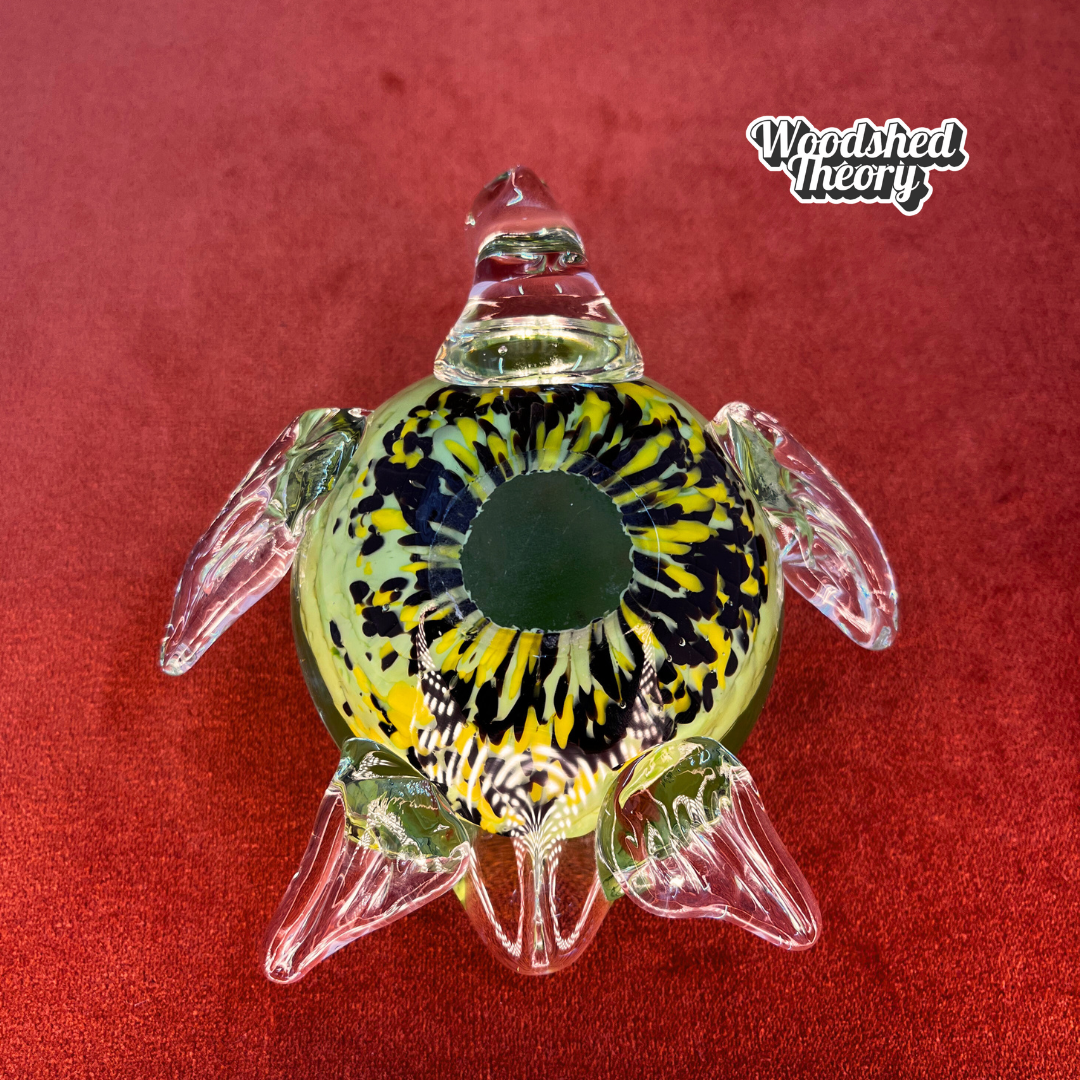 Vintage Fifth Avenue Crystal sea turtle paperweight in light green handblown glass with speckled shell. Bottom