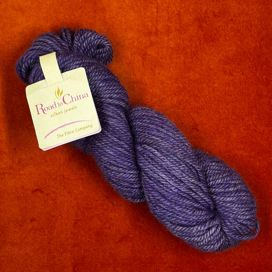 Hank of Road to China by The Fiber Company in Rose de France – soft pink yarn made with baby alpaca, camel, cashmere, yak, and soya fiber, sport weight. top down