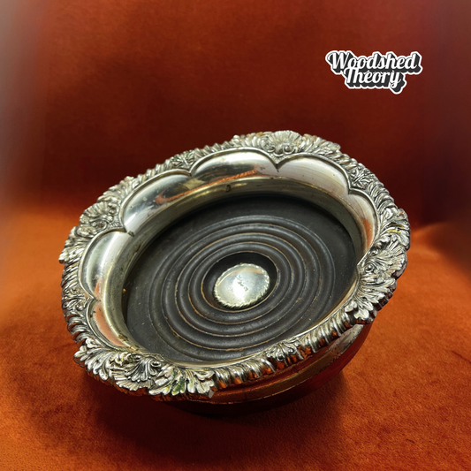 Vintage Corbell & Co. silver plate wine or champagne coaster with shell design and felt bottom. inside