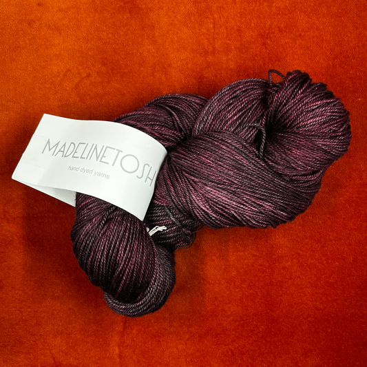 One skein of Madeline Tosh Pashmina yarn in Oxblood – a hand-dyed sport weight blend of merino, silk, and cashmere. top down