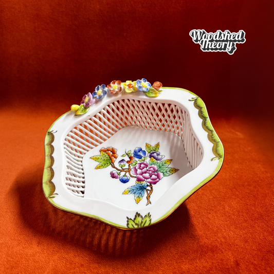 Vintage Herend Hungarian porcelain dish in Rothschild Bird pattern with woven basket design and raised flowers. side profile 