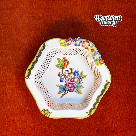 Vintage Herend Hungarian porcelain dish in Rothschild Bird pattern with woven basket design and raised flowers. top down
