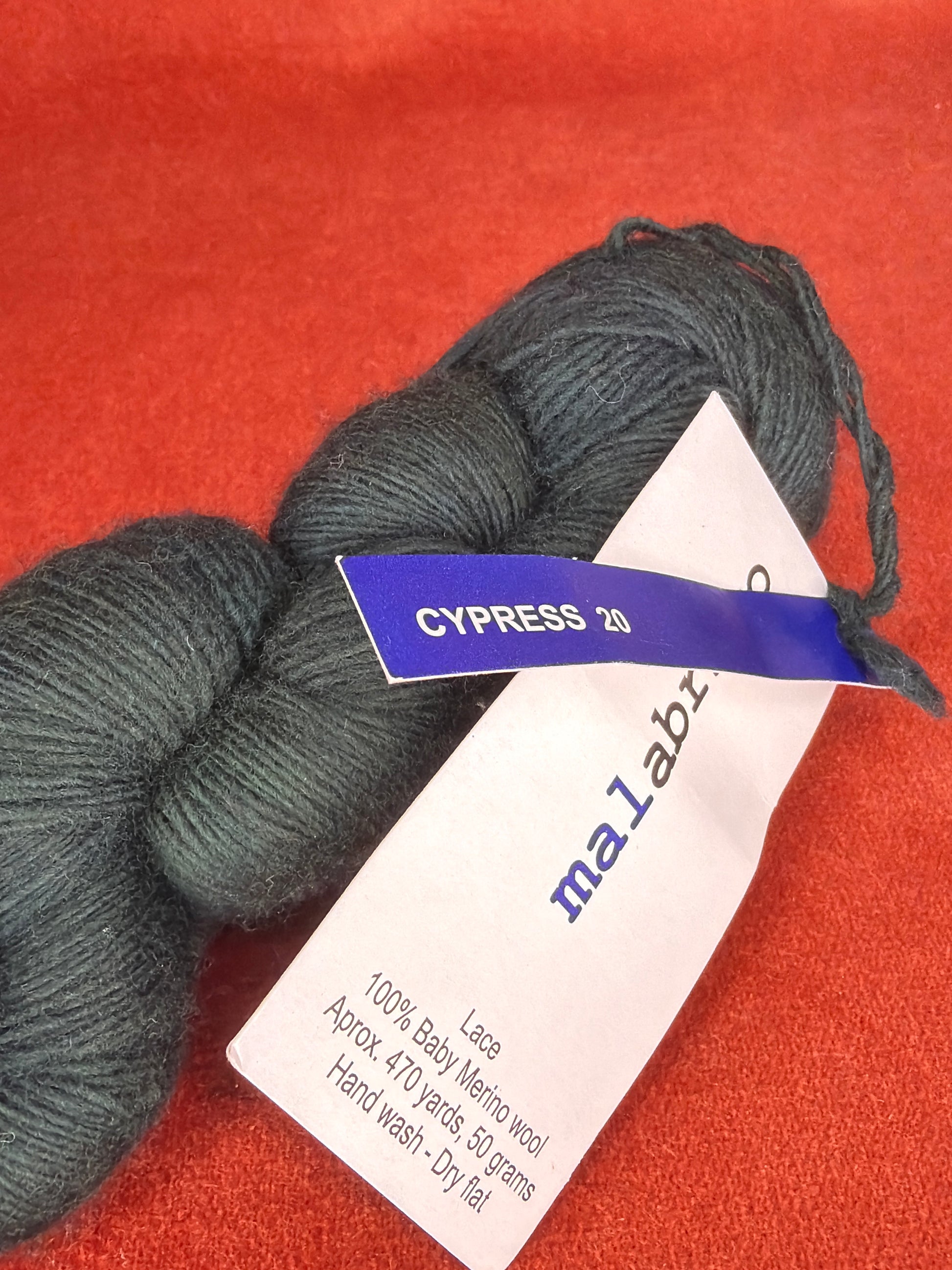 1 Hank Malabrigo Lace Col. 20 Cypress (Black forest green) close up