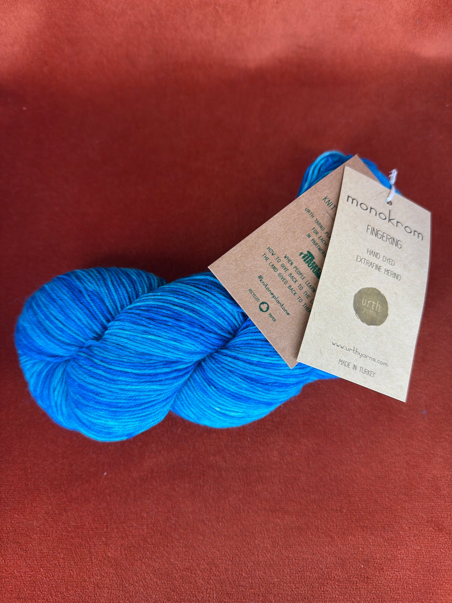 1 Hank Monokrom Fingering by Urth Yarns Color 3057 Lot 26521 (Ocean Blues) top down