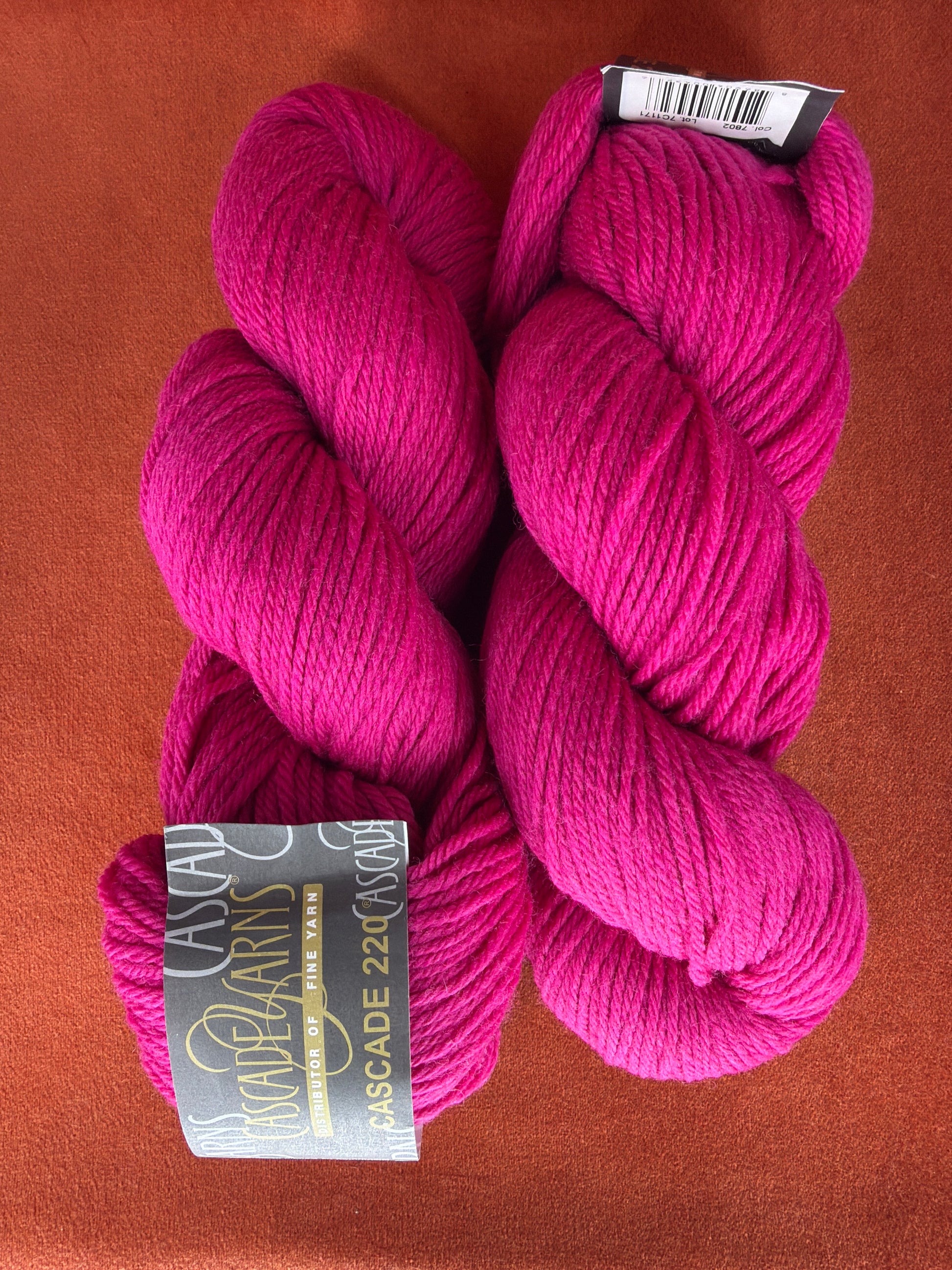 2 Hanks Cascade 220 Col. 7802 Cerise top down