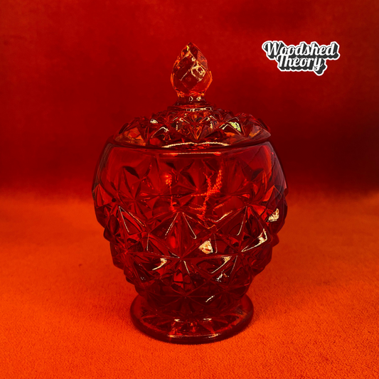 Indiana Glass Amberina faceted red-orange glass candy dish with lid, cadmium glow under black light front side