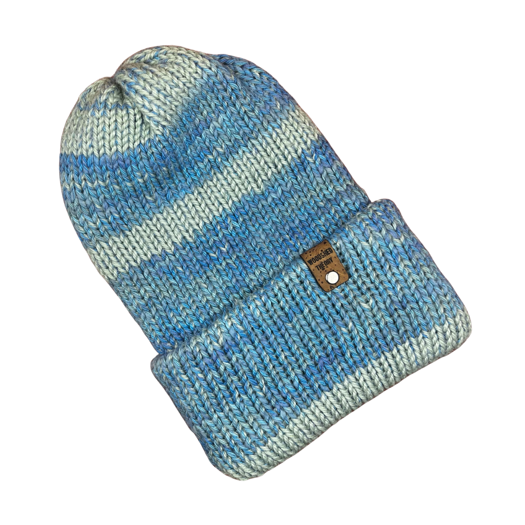 Muted blue double-layered knit beanie with cork tag, made with organic cotton, wool, and recycled fiber, hand crafted by Woodshed Theory front