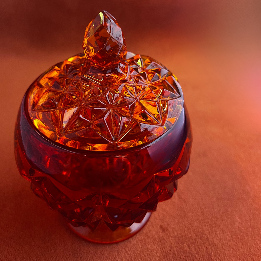 Indiana Glass Amberina faceted red-orange glass candy dish with lid, cadmium glow under black light top lid detail 