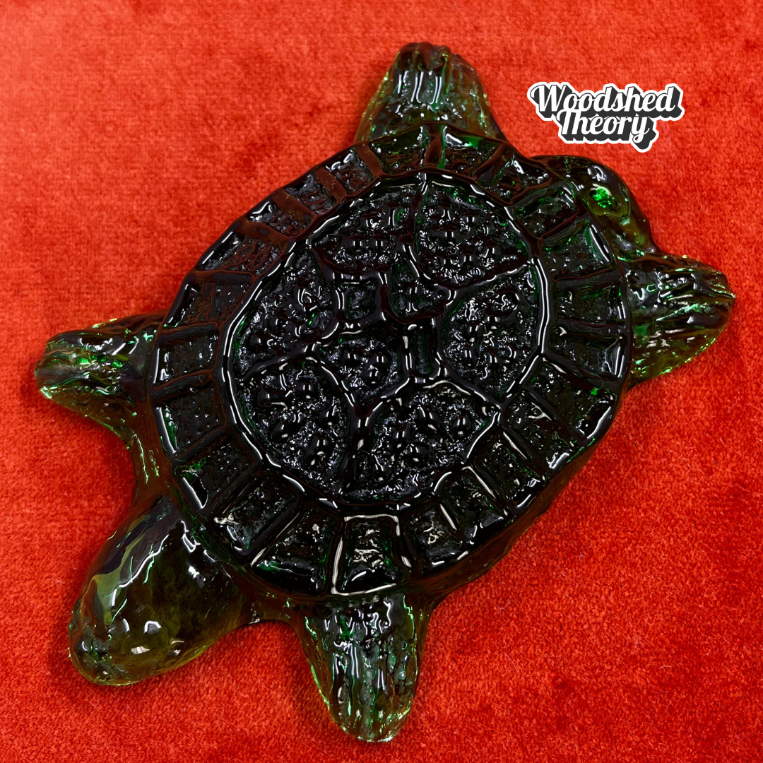 Hand-blown Blenko glass turtle paperweight in dark green, crafted by artisans in West Virginia. Unique American art glass collectible. top down 