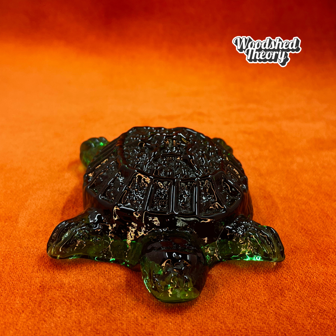 Hand-blown Blenko glass turtle paperweight in dark green, crafted by artisans in West Virginia. Unique American art glass collectible. front