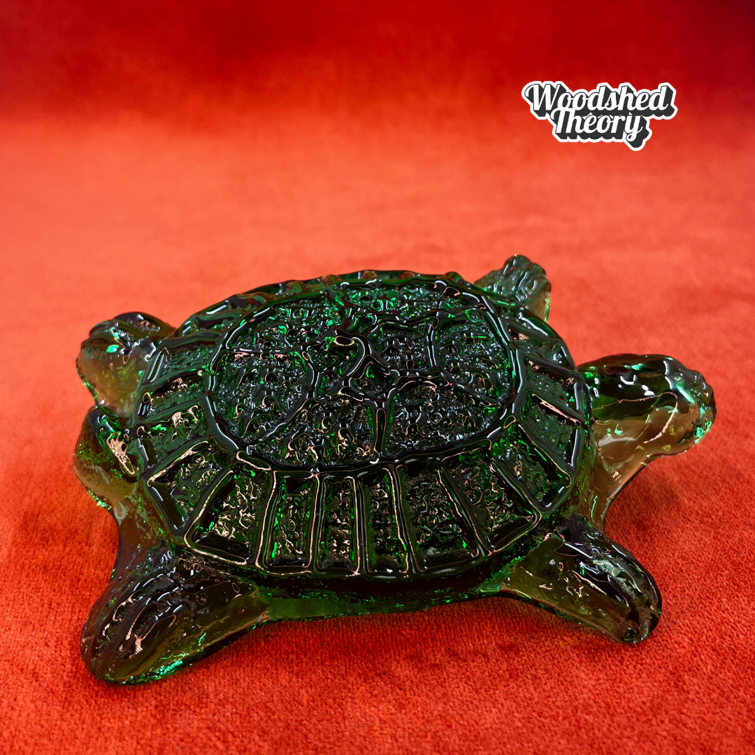 Hand-made Blenko glass turtle paperweight in dark green, crafted by artisans in West Virginia. Unique American art glass collectible. side