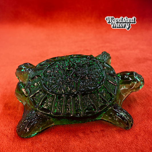 Hand-made Blenko glass turtle paperweight in dark green, crafted by artisans in West Virginia. Unique American art glass collectible. side