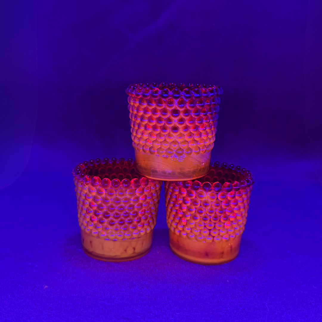 Set of Three Cadmium Votive Candle Holders under black light