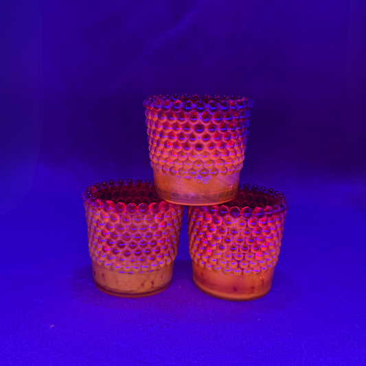 Set of Three Cadmium Votive Candle Holders under black light