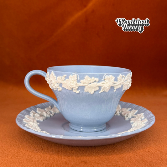 Vintage 1957 Wedgwood Blue & White Grapevine Teacup and Saucer Set side