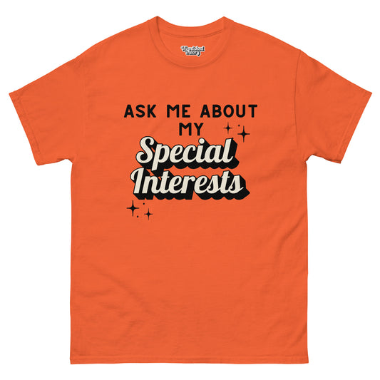 t-shirt that reads 'Ask Me About My Special Interests' — neurodivergent conversation starter graphic tee by Woodshed Theory color orange front flat 